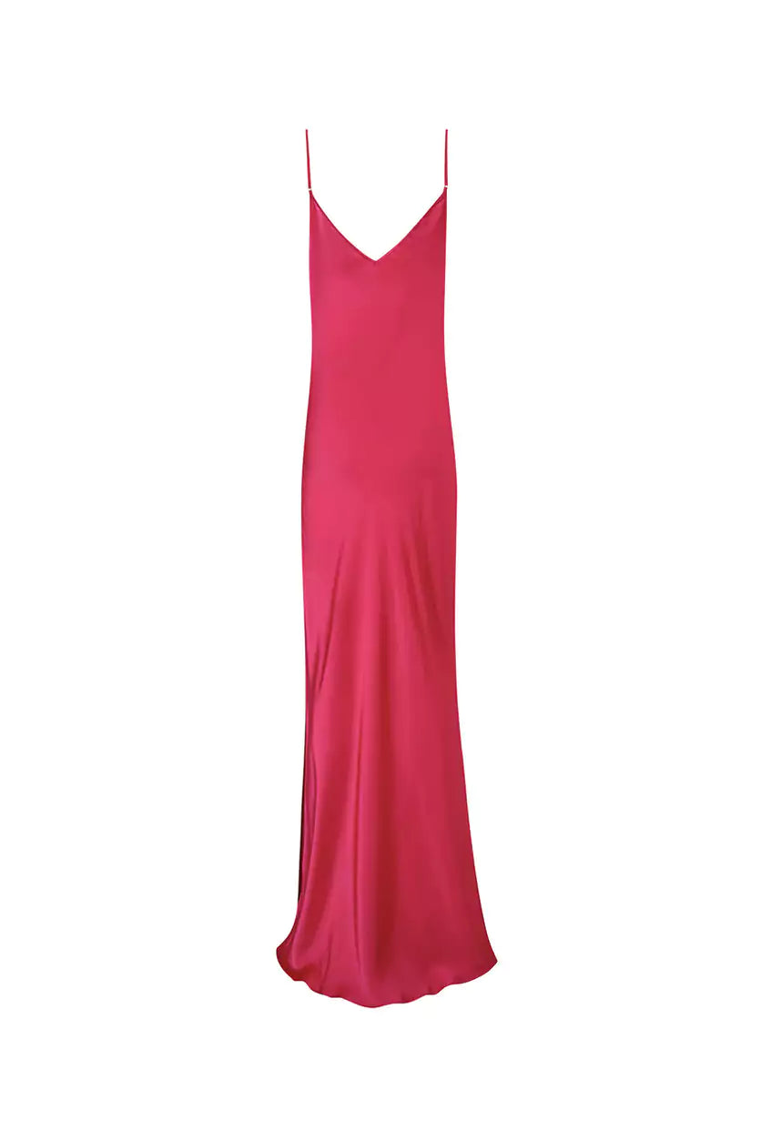 A pink slip dress on a white background.
