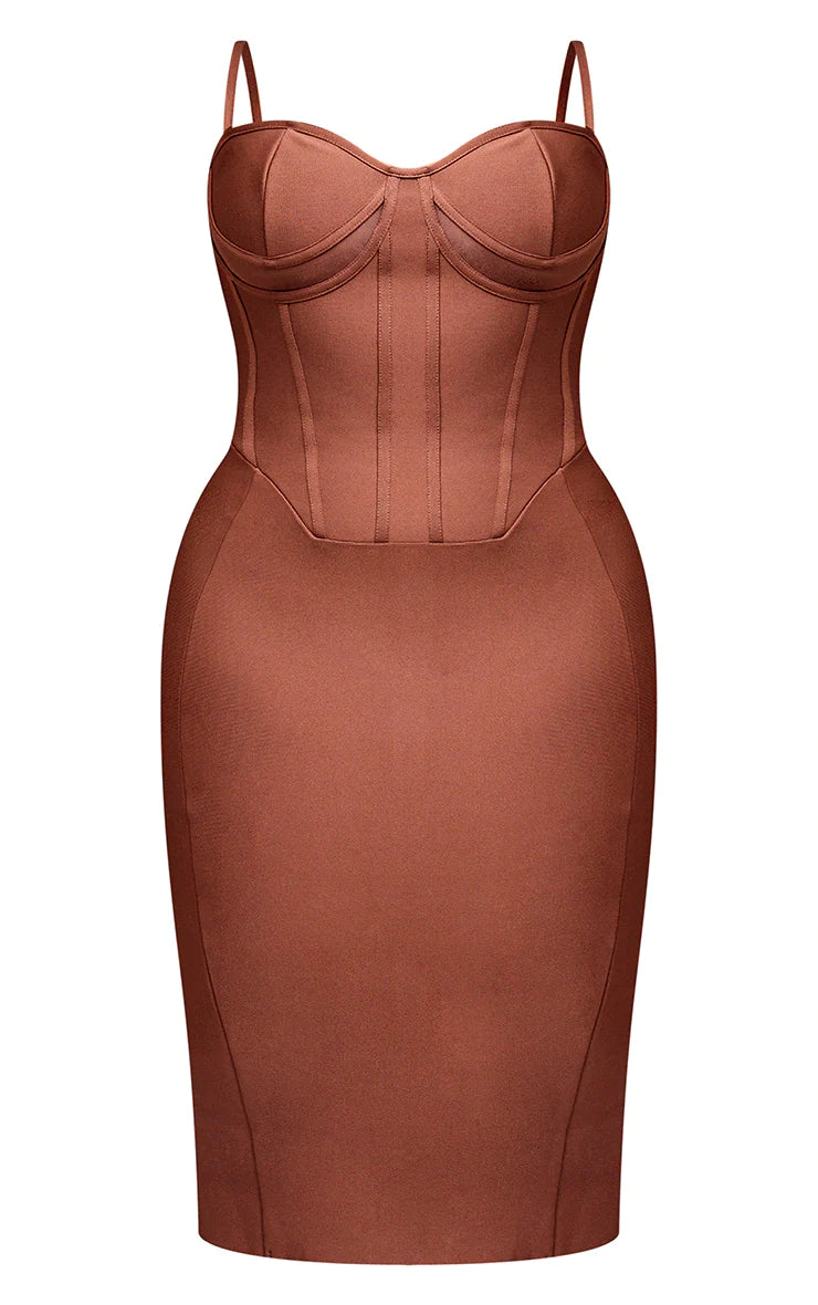 A brown bandage dress with straps.