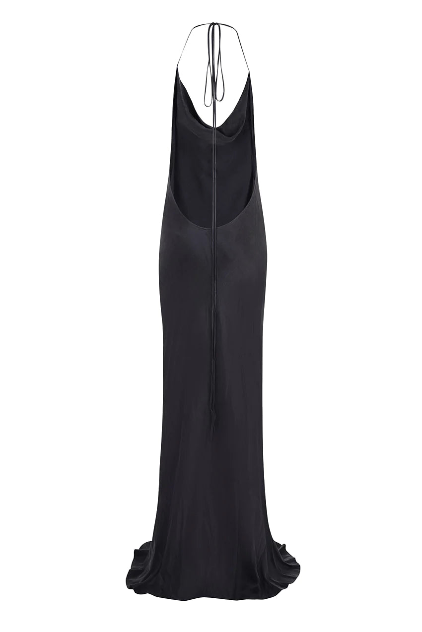 The back view of a black maxi dress.