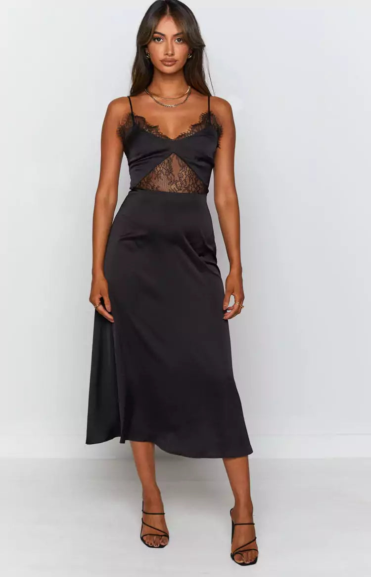 A model wearing a Zuri Black Midi Dress with lace detailing, perfect for a Matric Dance or any formal occasion.