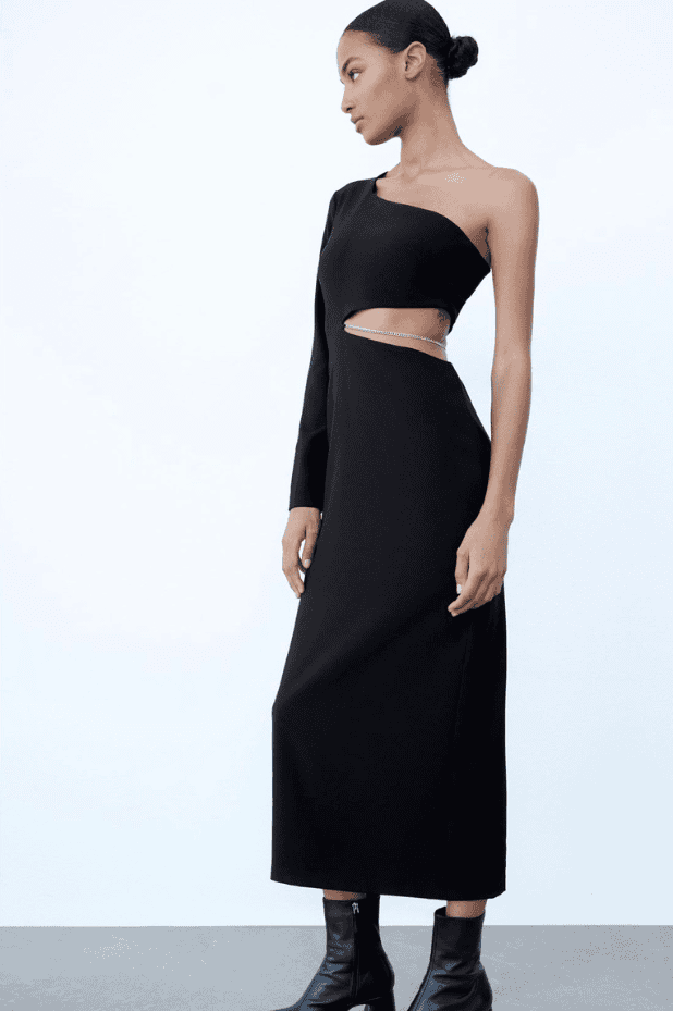 The model is wearing a Zara Siena dress, a showstopper with cutouts on the shoulders.